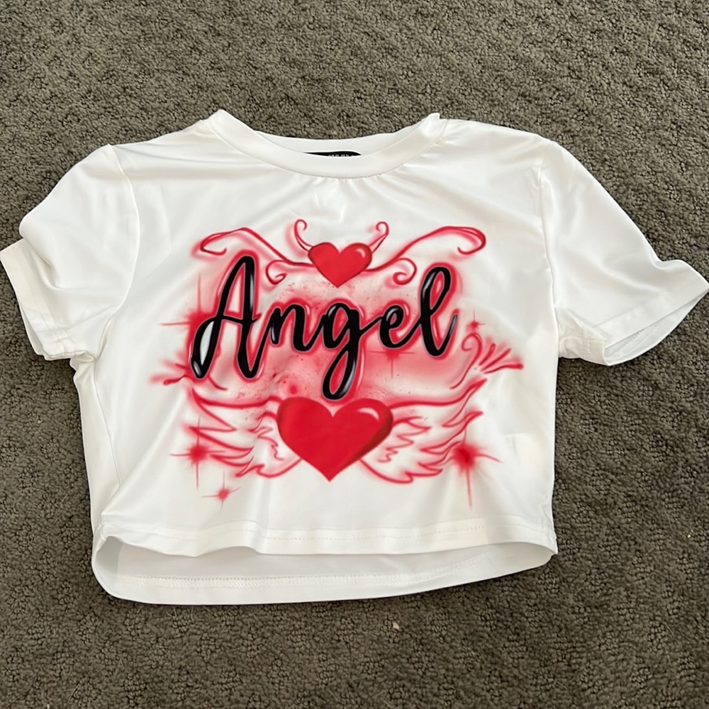 White and pink angel shirt. Size EXTRA SMALL